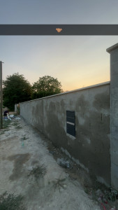 Photo de galerie - Clôture parpaing banchée