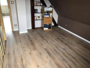 Photo de galerie - Pose de sol stratifié + plynthe 