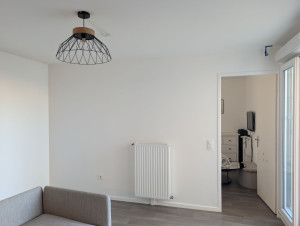 Photo de galerie - Réalisation de peinture satinée dans le salon 