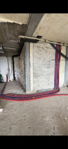 Photo de galerie - Passage de la tuyauterie avant passage du plaquiste