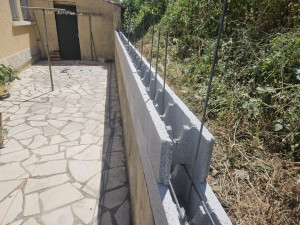 Photo de galerie - Réalisation d'un mur de retenue
