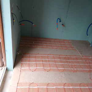 Photo de galerie - Pose de plancher chauffant. 