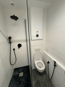 Photo de galerie - Rénovation salle de bain pose ballon d’eau chaude 