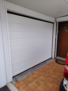 Photo de galerie - Remplacement tablier de porte sectionnelle 