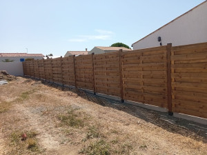 Photo de galerie - Réalisation clôture bois 
