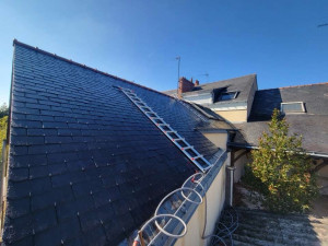 Photo de galerie - Application d’un hydrofuge toiture 