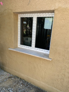 Photo de galerie - Déposer porte de garage et pose mur fenêtre et enduits 