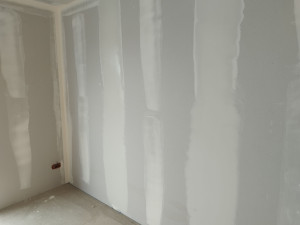 Photo de galerie - Plaquage et réalisation enduit 3 passes
