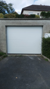 Photo de galerie - Porte de garage sectionnelle avec motorisation 