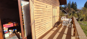 Photo de galerie - Ponçage de façade de chalet en bois 