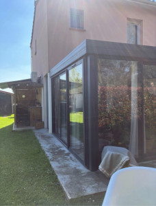 Photo de galerie - Pose de carrelage contour véranda 