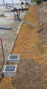 Photo de galerie - Pose des regards sur le réseau et finition au gravier