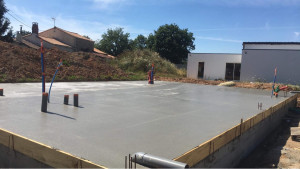 Photo de galerie - Coulage d’une dalle en vue de sanitaire