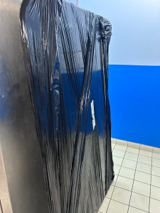Photo de galerie - Emballage d’un sommier 