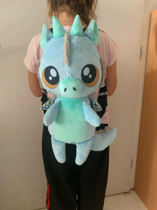 Photo de galerie - Création de sac à dos dragon 