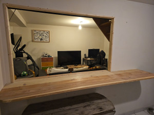 Photo de galerie - Création d'un bar/passe plat entre le salon et la cuisine 