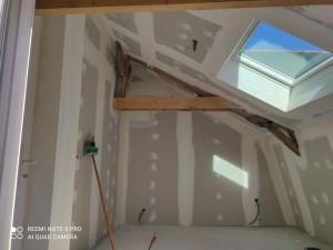 Photo de galerie - Réalisation d'une chambre dans un grenier , implantation isolation plaquage et les bandes 