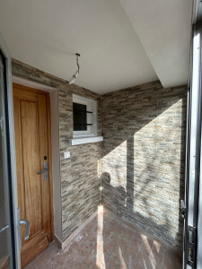 Photo de galerie - Pose de parement en entrée 