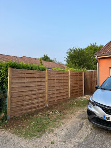 Photo de galerie - Installation de panneaux brise vue 