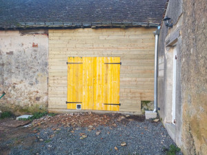 Photo de galerie - Fabrication et pose ossature bardage et porte bois 
