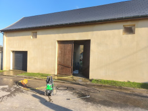 Photo de galerie - Réalisation d'un enduit gratté 