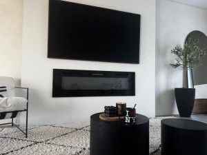 Photo de galerie - Encadrement pour TV et cheminée 