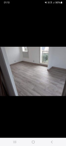 Photo de galerie - Pose de parquet + plinthes