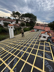 Photo de galerie - Mise en place de pare pluie/ écran sous toiture 