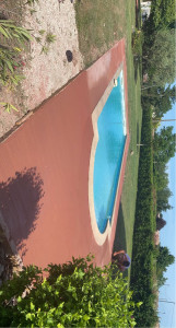 Photo de galerie - Création d’une dalle autour d’une piscine