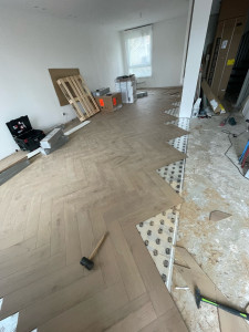 Photo de galerie - Pose de parquet flottant chevron
