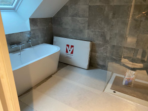 Photo de galerie - Pose du carrelage dans une salle de bain 