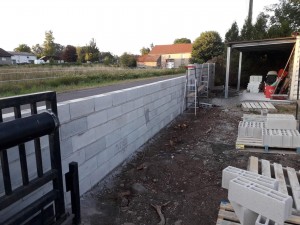 Photo réalisation - Maçonnerie - Aurelien - Champagney : Construction d'un mur de clôture en parpaing 