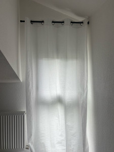 Photo de galerie - Installation de rideaux et tringle à rideaux
