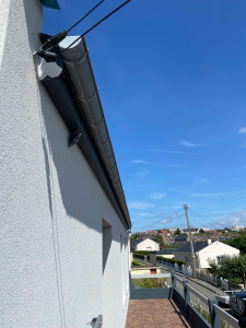 Photo de galerie - Fabrication et pose de tôle plié Alu gris anthracite pour couvrir cache moineau 