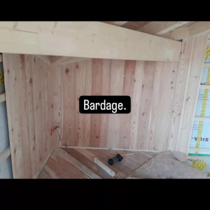 Photo de galerie - Bardage et parquet. 