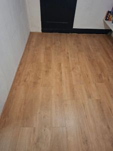 Photo de galerie - Pose parquet imitation chêne 