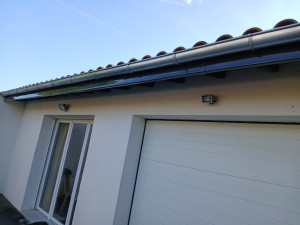 Photo de galerie - Pose gouttière en zinc