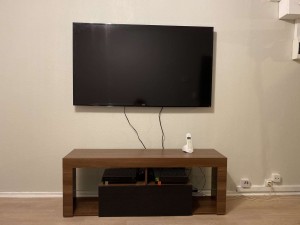 Photo de galerie - Montage d'un meuble télé + fixation de la télé au mur 
