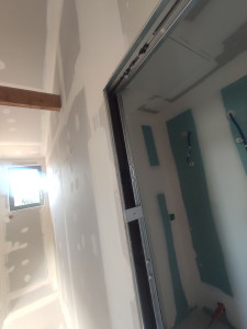 Photo de galerie - Création des cloisons et la pose de porte à galandage
