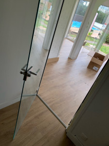 Photo de galerie - Pose de parquet stratifié avec isolation, plus barre de seuil