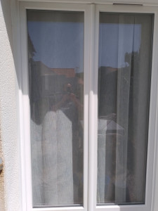 Photo de galerie - Porte avec deux petite vitres