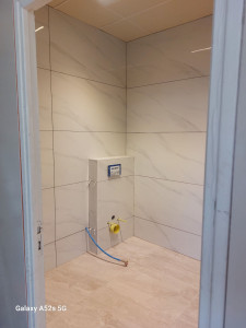 Photo de galerie - Salle de bain en cours d'exécution 