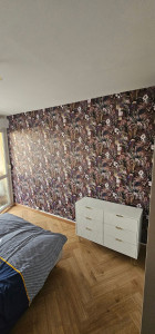 Photo de galerie - Pose de tapisserie.