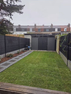 Photo de galerie - Réaménagement d'un jardin complet pose de pelouse naturel chemin piéton pavé et gravier bordure avec plantation