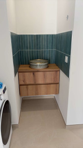 Photo de galerie - Pose d’un meuble et vasque 