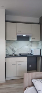 Photo de galerie - Nettoyage d'une cuisine après départ locataire. 