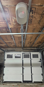 Photo de galerie - Installation d'une porte sectionnelle motorisée