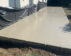 Photo de galerie - Réalisation d’une dalle de terrasse en béton 