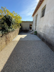 Photo de galerie - Après - pose d’une dalle béton avec kit caniveau et terrassement 