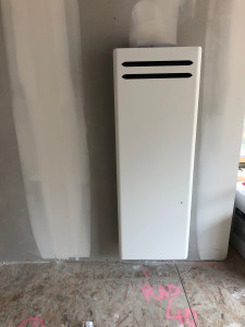 Photo de galerie - Installation de radiateurs connectés.